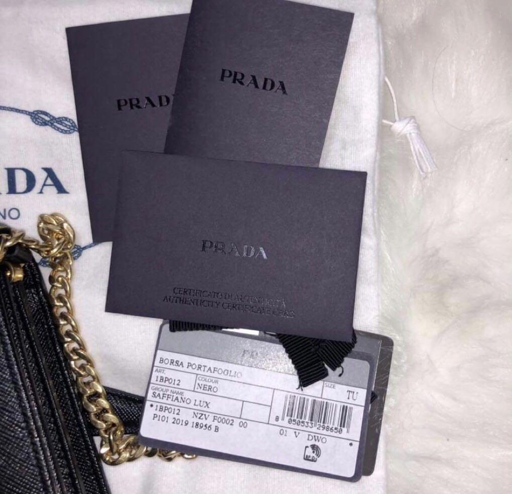 Prada logo-lettering Saffiano leather shoulder bag - ShopStyle