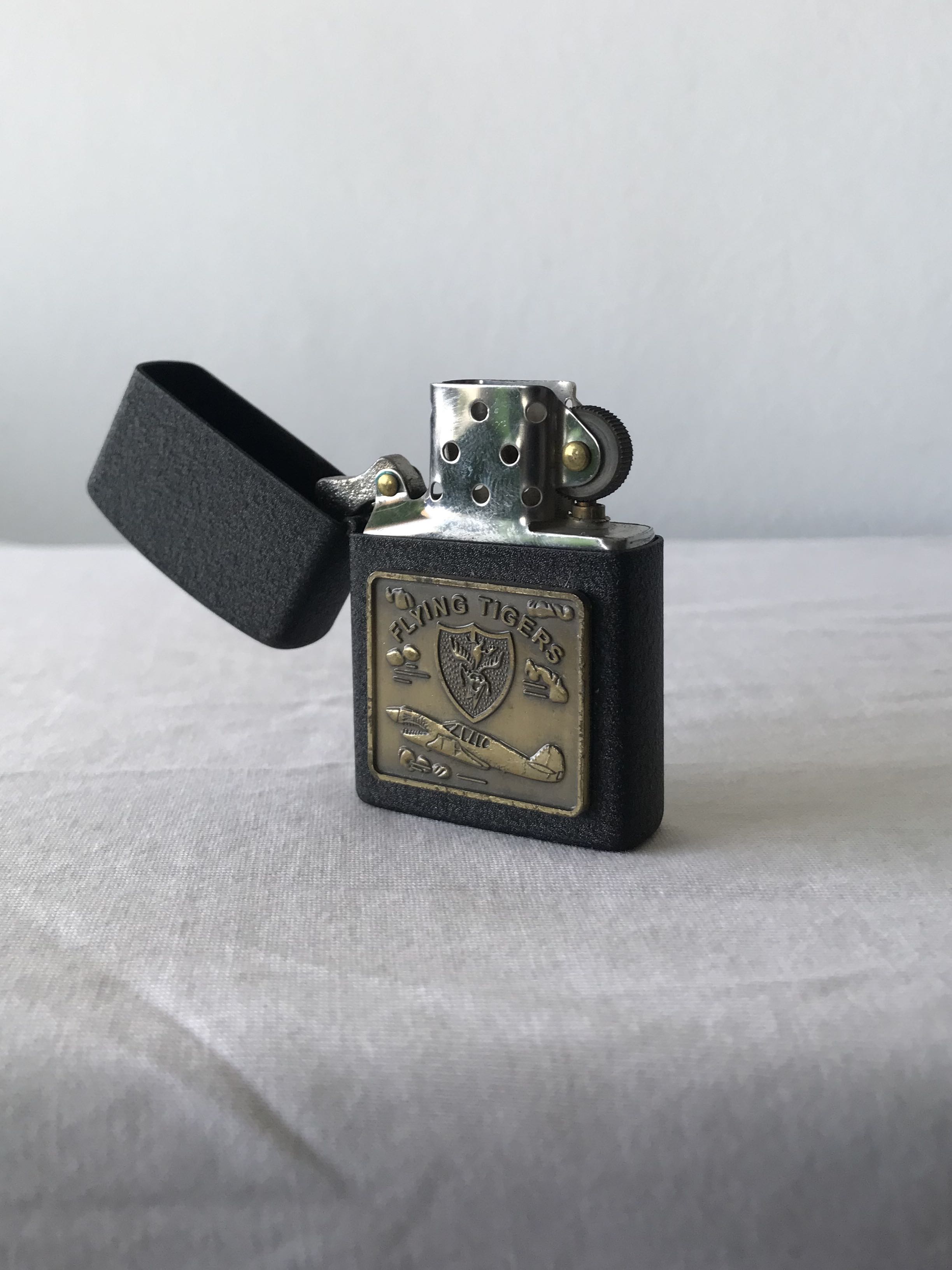 Vintage WWII Flying Tigers fluid lighter, Everything Else on Carousell