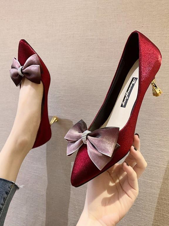 Red high heels with bow hot sale