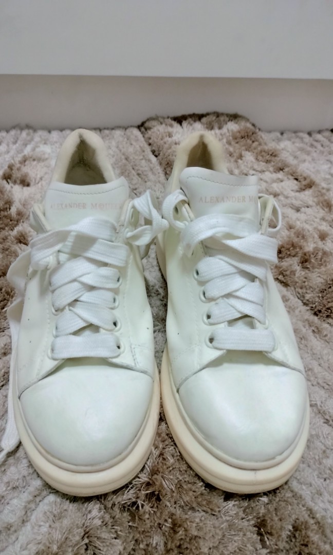 white trainers with silver back