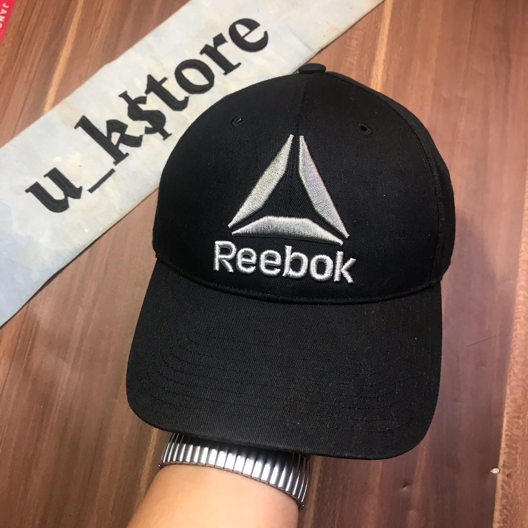 topi reebok original'