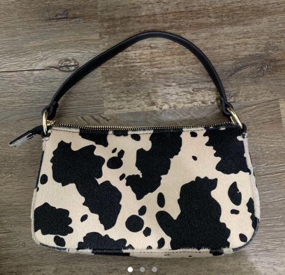 FLASH SALE - Cow print bag (Category: Shoulder Bags) located in Valenzuela. Submitted by rachdeclutters (Listing ID 1166949884, Image 1). Description: bought for 1200 on depop. Color is fading.