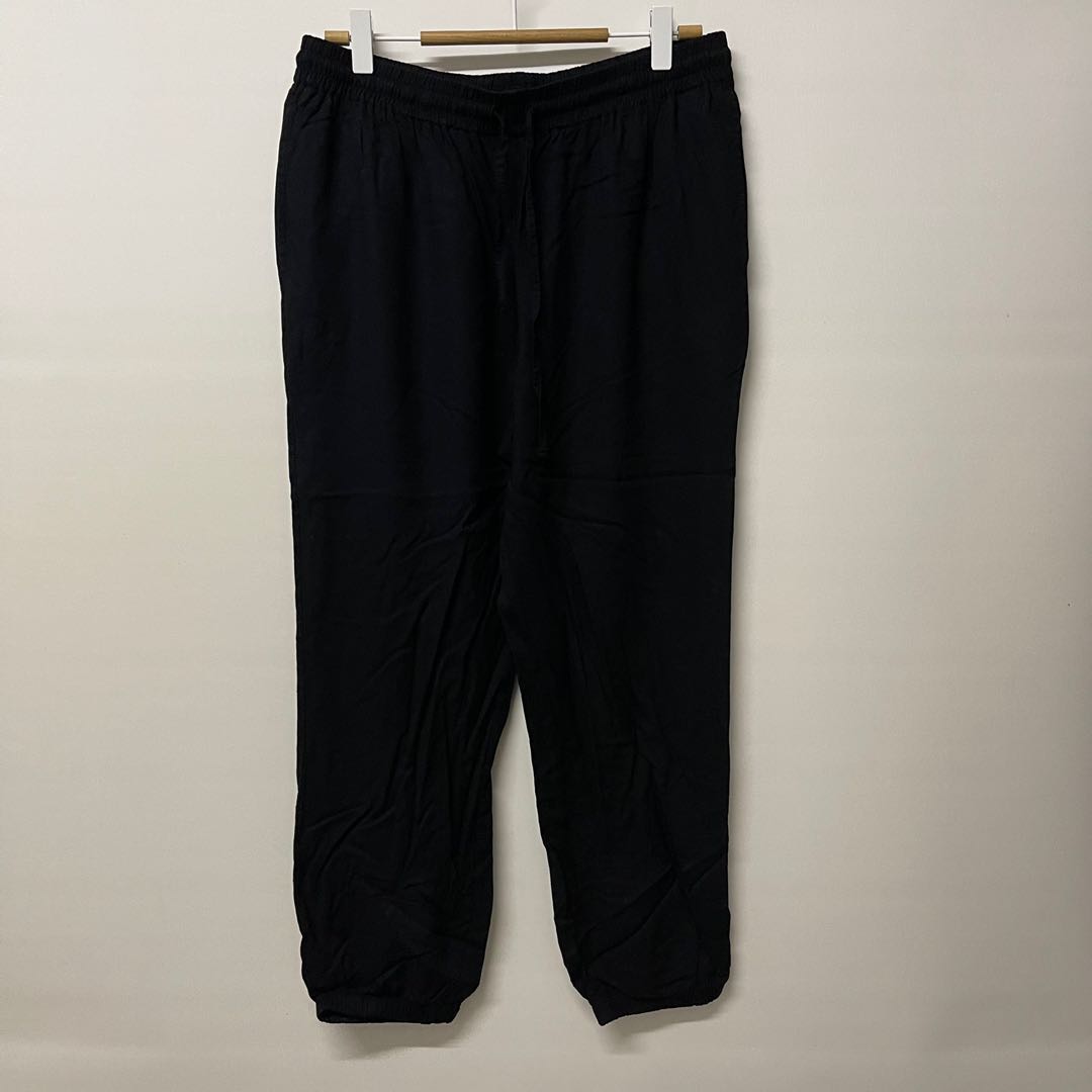Uniqlo black drape pants with pockets, Women's Fashion, Bottoms, Other ...