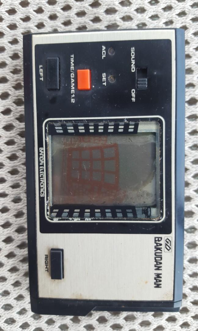 Vintage Handheld Gaming Console (Category: Others) located in Binangonan. Submitted by stufflikedat (Listing ID 1166975005, Image 2). Description: Vintage handheld gaming console 1.BANDAI BAKUDAN MAN (black) Japan 1980s in good working condition, 2 cell batt needed SOLD! 2.BANDAI HAMBURGER SHOP (orange) Japan 1980s in good working condition, 2 cell batt needed SOLD! 3.FINGER DANCE (red orange) in good working condition, 2xAA batt needed for 800 4