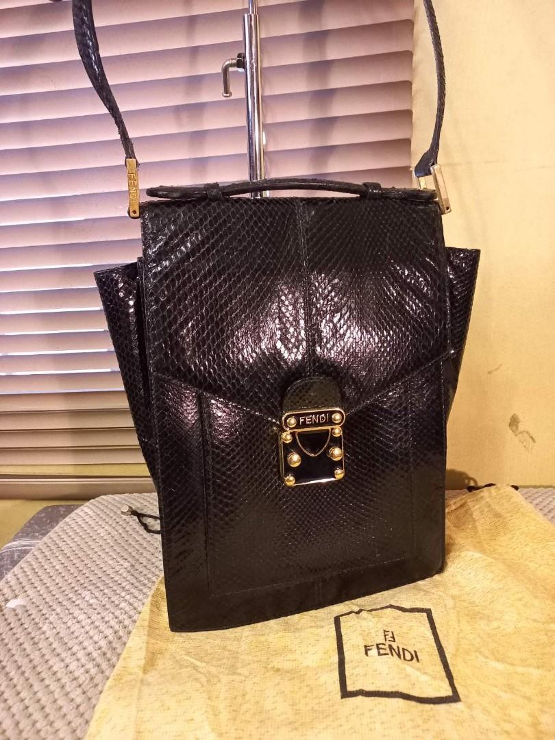 Authentic Fendi Vintage Python square flap bag (Category: Luxury Bags & Wallets) located in Antipolo. Submitted by myfamiliar (Listing ID 1167096521, Image 1). Description: Authentic check photos leather interior, vintage no code 8" L x 10" H x 3.75" W.