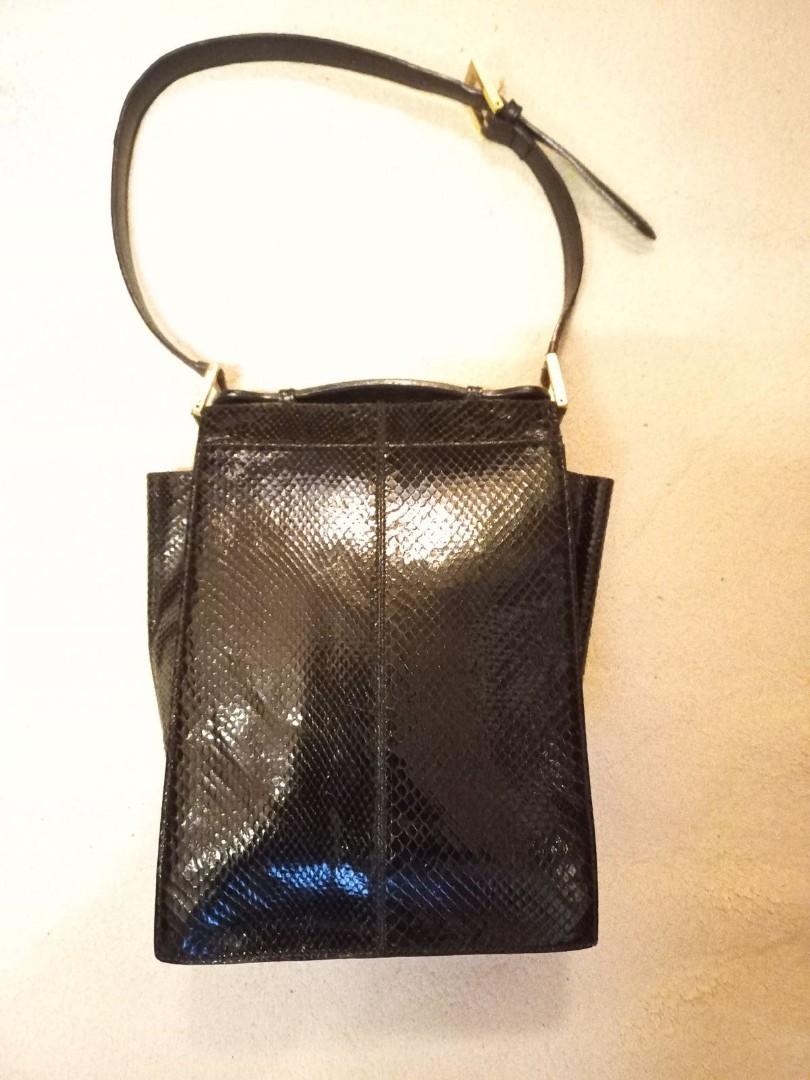 Authentic Fendi Vintage Python square flap bag (Category: Luxury Bags & Wallets) located in Antipolo. Submitted by myfamiliar (Listing ID 1167096521, Image 2). Description: Authentic check photos leather interior, vintage no code 8" L x 10" H x 3.75" W.