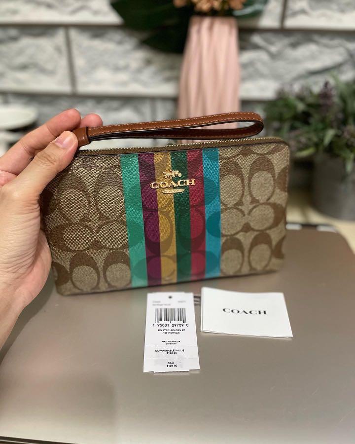 coach large corner zip wristlet (Category: Wallets & Card holders) located in Makati City. Submitted by mylittlechicshop (Listing ID 1167170633, Image 2). Description: Large Corner Zip Wristlet in signature Canvas ✅1 pc only 3,500 only Signature coated canvas and smooth leather Two credit card slots Zip closure fabric lining Wrist strap attached 7 3/4 (L) x 4 3/4 (H) x 1/2 (W) fits large phones 💯guaranteed original from 🇺🇸 on hand and ready to