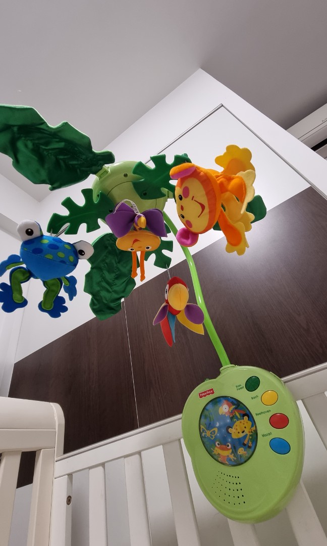 Fisher Price baby cot mobile musical rainforest theme, Babies & Kids