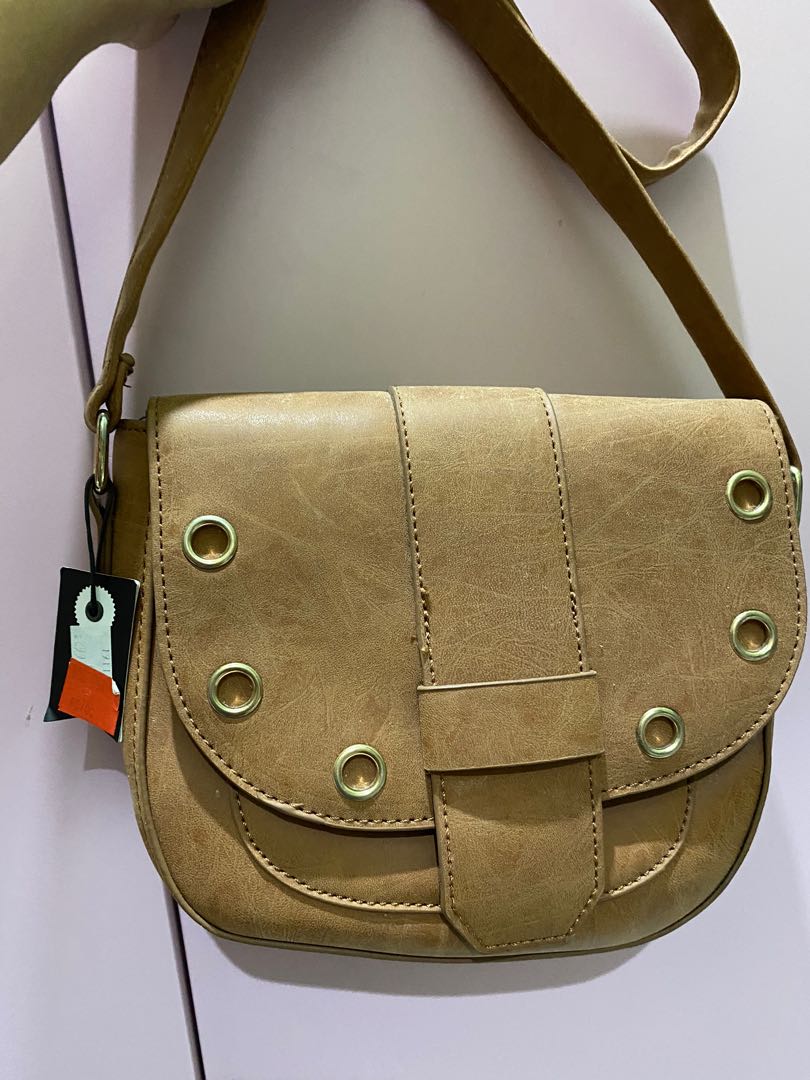 Typo sling bag store