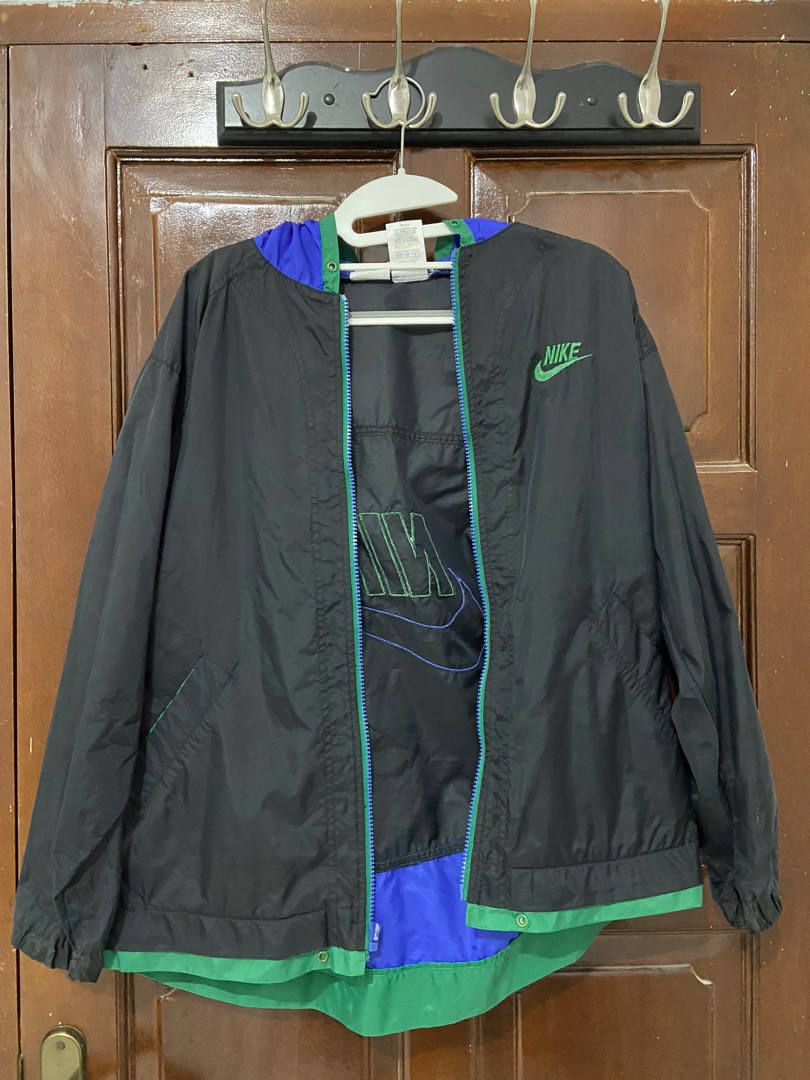 green and purple nike windbreaker