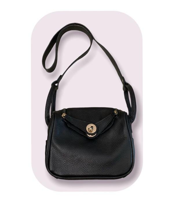 Preloved genuine leather lindy style two way bag (Category: Luxury Bags & Wallets) located in Muntinlupa City. Submitted by alabangbargains (Listing ID 1167494049, Image 1). Description: Brand: No brand Material : genuine pebbled texture leather Size : 8 x 6 x 4.75 inches Color: black Lock: twist lock and zipper Hardware: light gold colored metal Style: handbag, shoulder bag, crossbody Interior: leather no lining Exterior: 2 slide side pockets Co