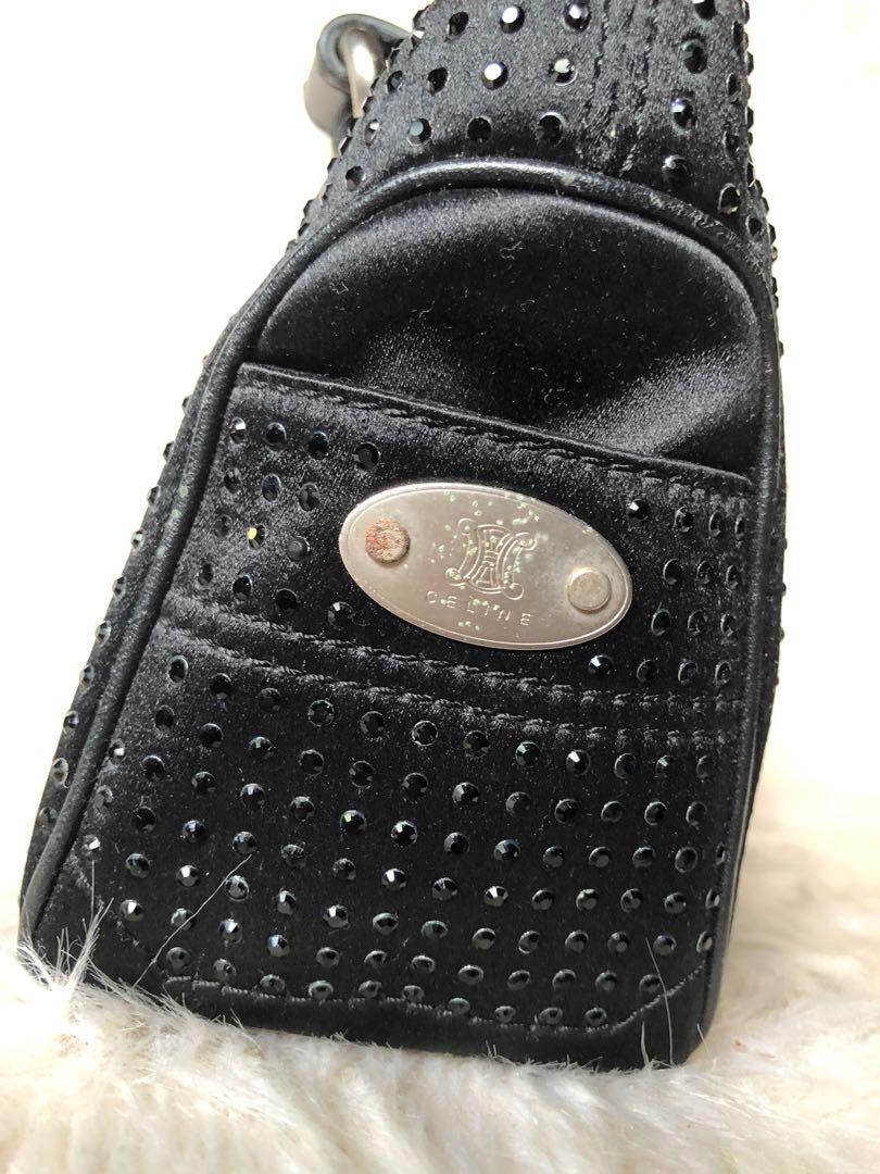 CELINE BOOGIE SILK BAG (Category: Luxury Bags & Wallets) located in Naga. Submitted by shieshop (Listing ID 1164093393, Image 2). Description: Celine Boogie silk bag from Japan Sign of usage Preloved From 9500 .
