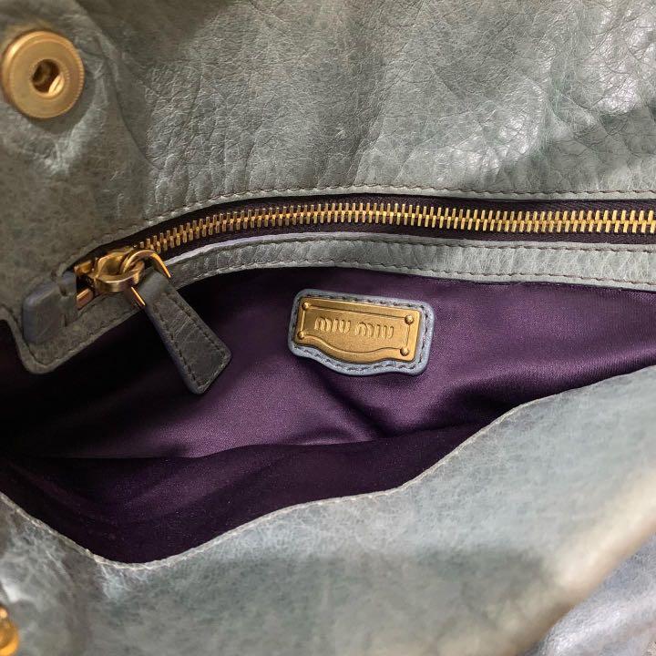 Miu Miu distressed leather hobo bag, Luxury, Bags & Wallets on Carousell