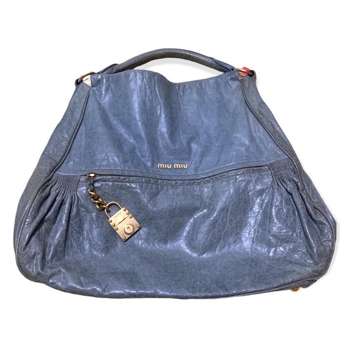 Miu Miu distressed leather hobo bag, Luxury, Bags & Wallets on Carousell