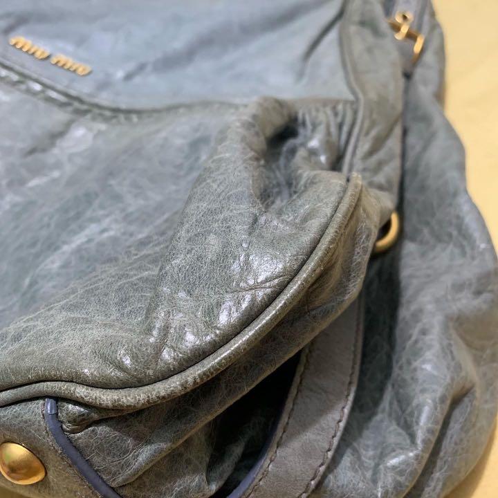Miu Miu distressed leather hobo bag, Luxury, Bags & Wallets on Carousell