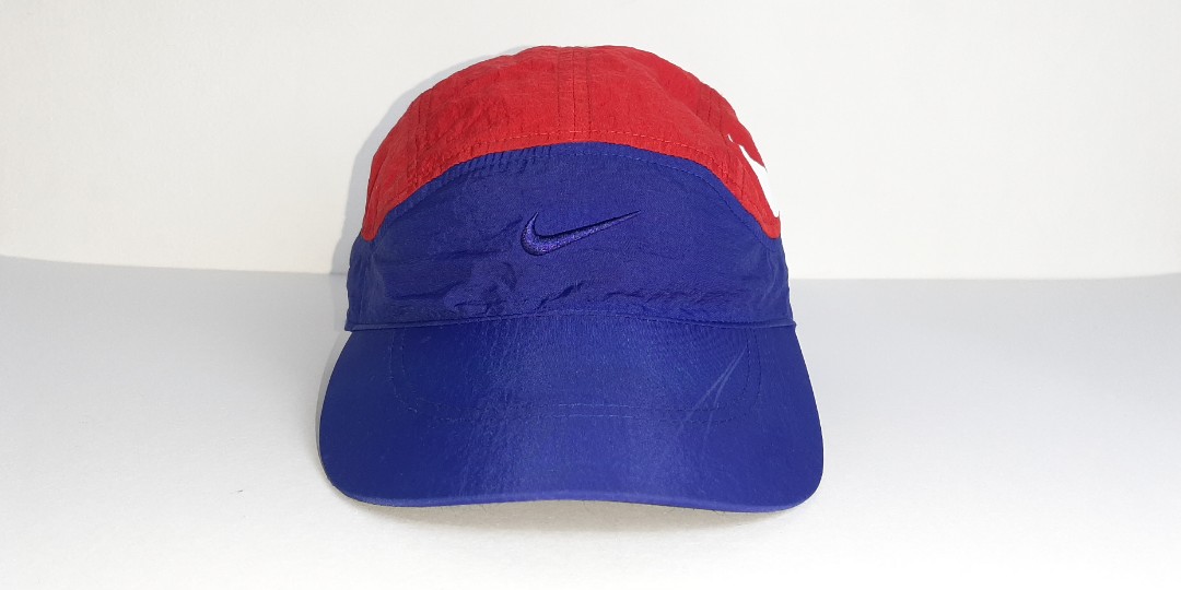nike tailwind caps