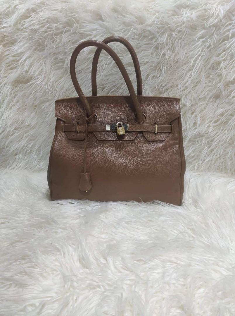 Vintage Hermes bag (Category: Luxury Bags & Wallets) located in Paranaque City. Submitted by Stylerfinds (Listing ID 1164226181, Image 1). Description: Vintage Hermes bag P14k Togo leather Kindly self authenticate From thrift shop in italy With flaws on edges but still very pretty in actual. sf c/o buyer..