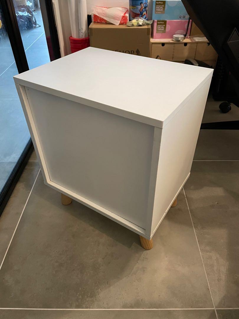 Bedside table (Category: Tables & Sets) located in Singapore. Submitted by moohippomoo (Listing ID 1167682272, Image 3). Description: One drawer left! The one that has minor defects is left. Please see photos for measurements. Approx measurements are: Width 41 cm Depth 31cm Height 49cm White bedside table with pink drawers. Can be used as a small coffee table or anywhere around your home. We used it to store kids books and stuff in the living roo