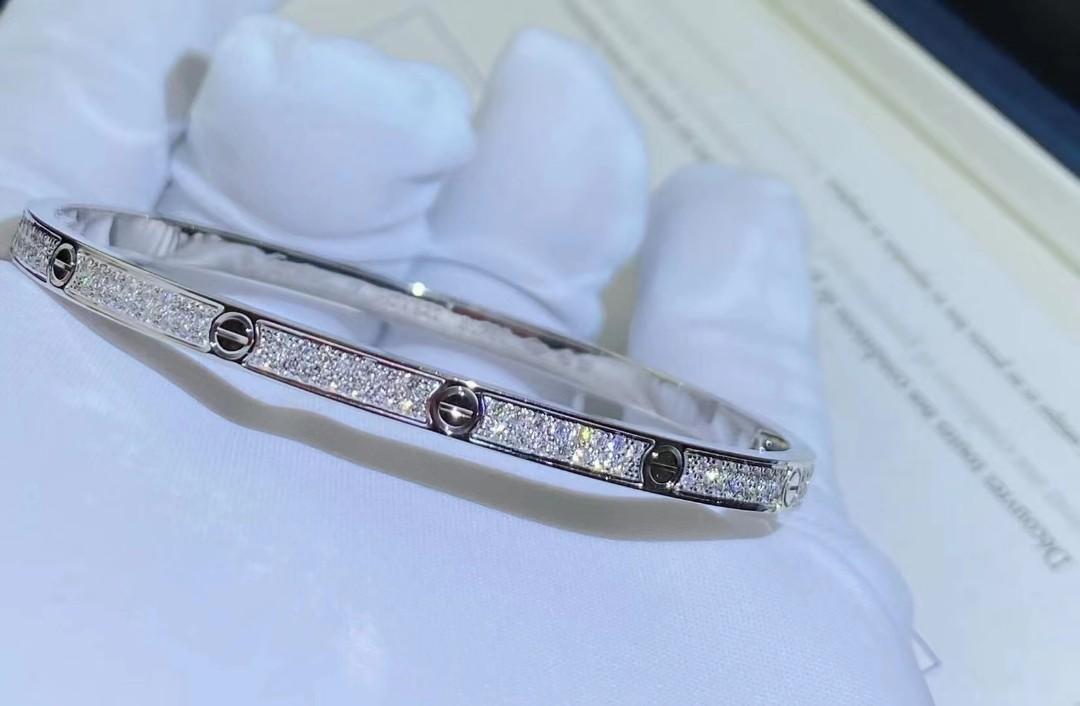 18K rose gold leaf bangle bracelet with round full cut diamonds and a pear  shape full cut diamonds  Neha Dani