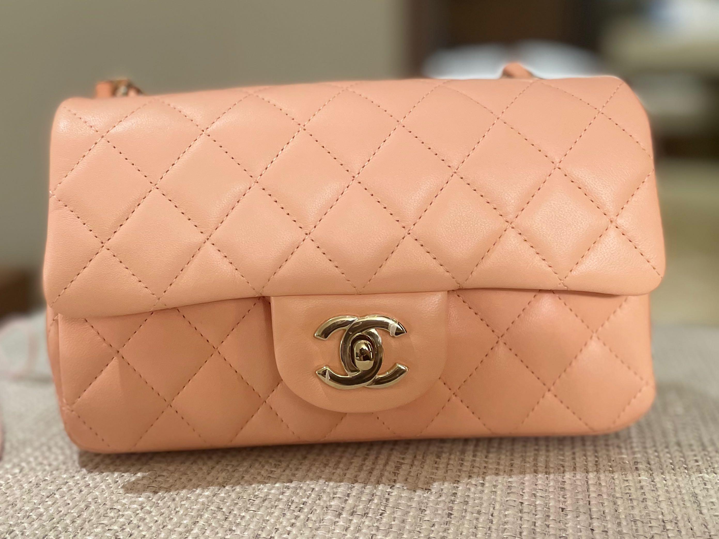 Light beige Chanel bag with a brush