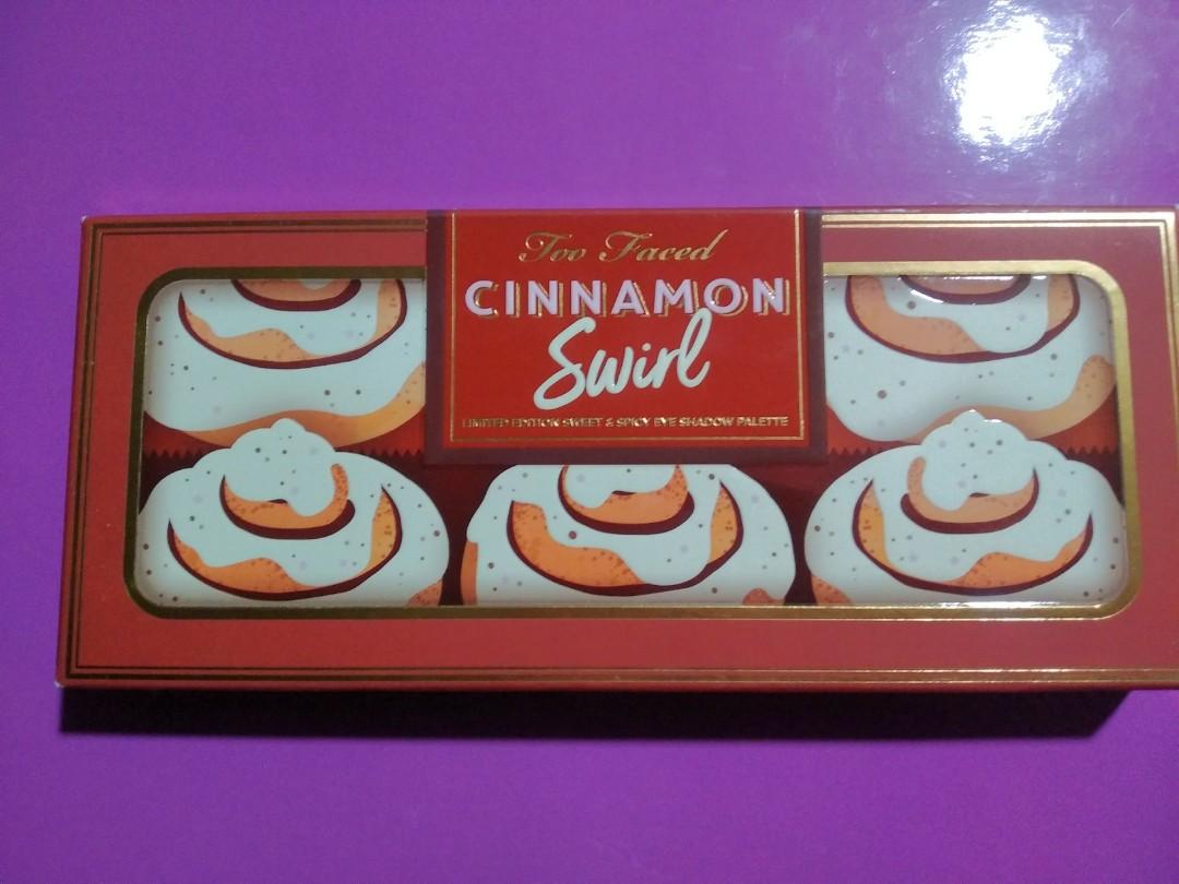 Too Faced Cinnamon Swirl (Category: Makeup) located in Marikina City. Submitted by whimpsypink (Listing ID 1167781279, Image 1). Description: Too Faced Cinnamon Swirl Eye Shadow Pallete Cinnamon Swirl Eyeshadow Palette is a limited-edition holiday special that smells as delicious as it looks. The 18-pan eyeshadow palletes features a variety of matte, metallic, and shimmery hues in cool and warm tones inspired by the delicious dessert, with cheeky