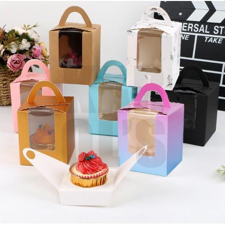 1pc Cupcake Box Solo with Handle/Holder (Category: Storage Boxes & Baskets) located in Malabon City. Submitted by heyitskhen (Listing ID 1141513986, Image 1). Description: Size: 9.2cm x 9.2cm x 11cm Holder Indise: 6.5cm can fit to 3oz cupcake with holder 1 hole (solo) 15 pesos each color: white brown blue red purple black marble pink green gold gradient location: malabon city 1 order=1pc only.
