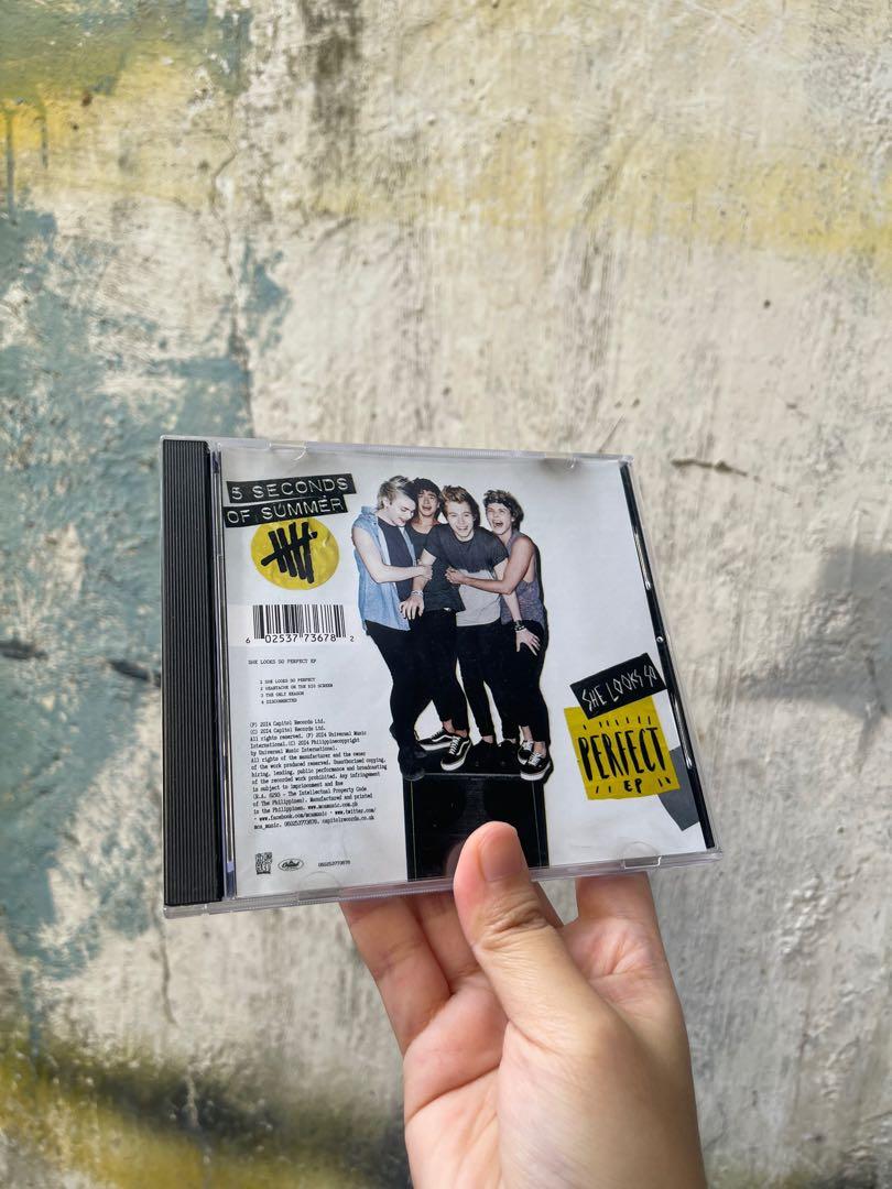 5SOS: She Looks So Perfect EP CD (Category: CDs & DVDs) located in Makati City. Submitted by darlenesamson2 (Listing ID 1167928173, Image 1). Description: 5 seconds of summer played once. unsealed. stickers included..