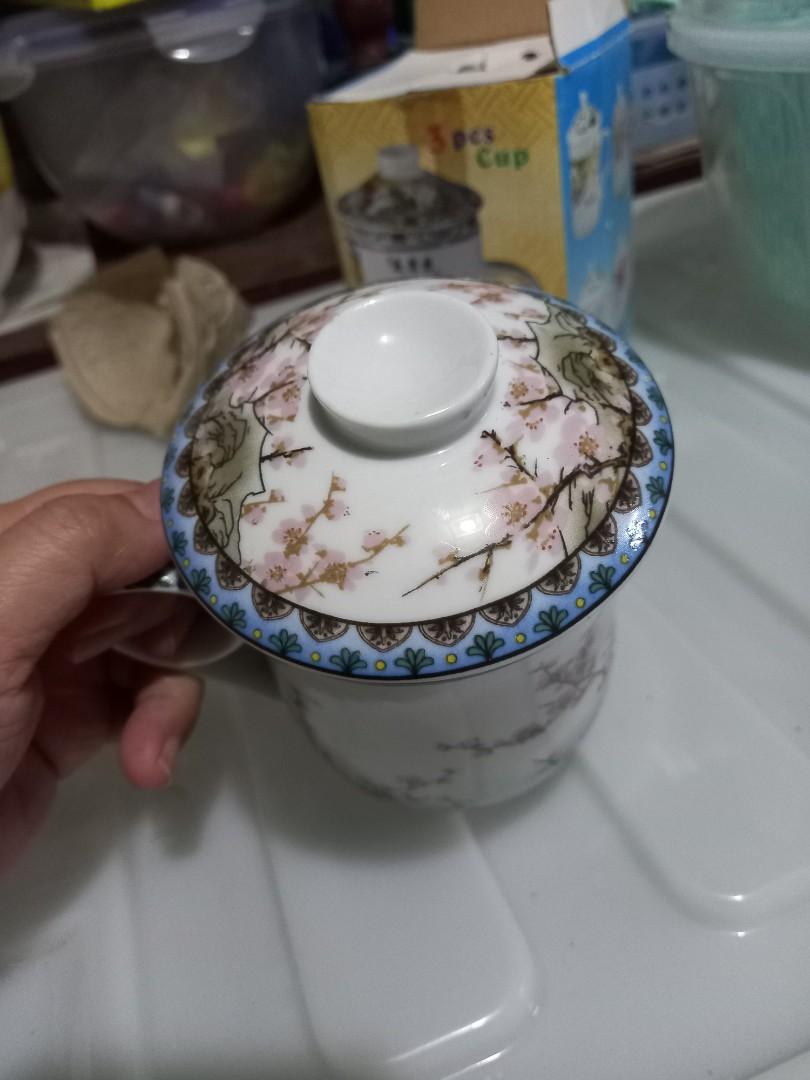 Ceramic tea cup for loose leaf tea (Category: Coffee & Tea Tableware) located in Pasig City. Submitted by nino_papa (Listing ID 1167946809, Image 3). Description: Authentic chinese ceramic tea cup for loose leaf tea. With tea strainer. Bought from Singapore at $20sg.