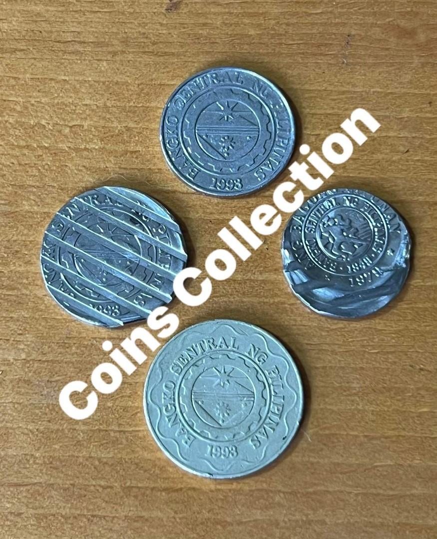 coin bundle (Category: Currency) located in Rizal. Submitted by CoinsCollection (Listing ID 1167898207, Image 2). Description: 1 pesos 2005 HTF 2pcs waffle error coin 1997 no mint mark 5pesis BSP RDE 90degrees call 09984991611.