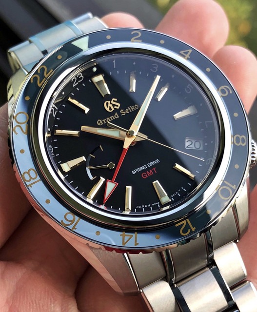 Grand Seiko Spring Drive GMT SBGE215 Titanium with gold color, Luxury,  Watches on Carousell