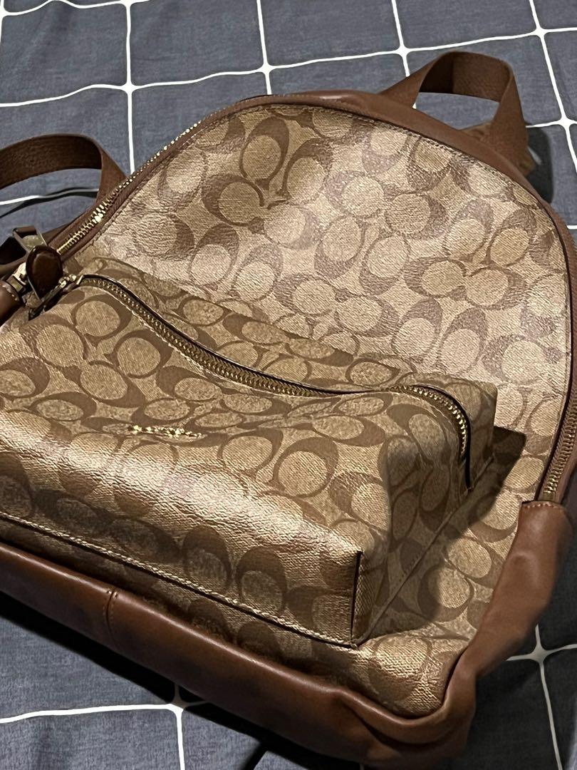 Coach Charlie Backpack in Khaki (Medium) (Category: Luxury Bags & Wallets) located in Del Monte. Submitted by _querencia (Listing ID 1168211130, Image 1). Description: Bought from the US Issue: Visible scratches on the lower back leather part of the bag .