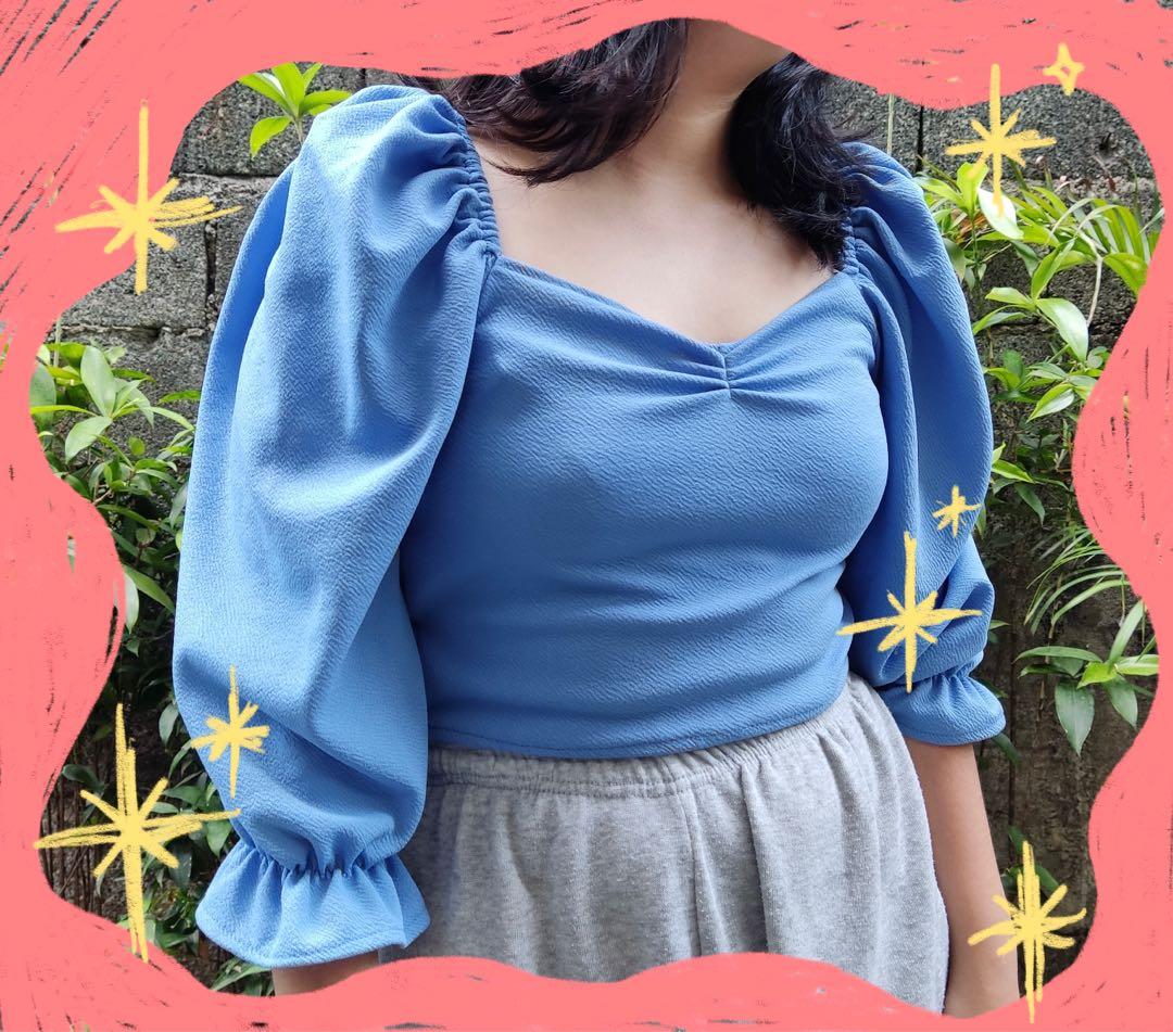 Powder Blue Puff Sleeves Top (Category: Blouses) located in Pasig City. Submitted by Ukaykalang_ (Listing ID 1168142761, Image 1). Description: one time ko lang yata siya nagamit pero aaaaaaa ang ganda niya talaga huhu pinagdadalawang isip ko pa to eh pero maliit na siya sakin ng slight no flaws and washed! free size (small to large) .