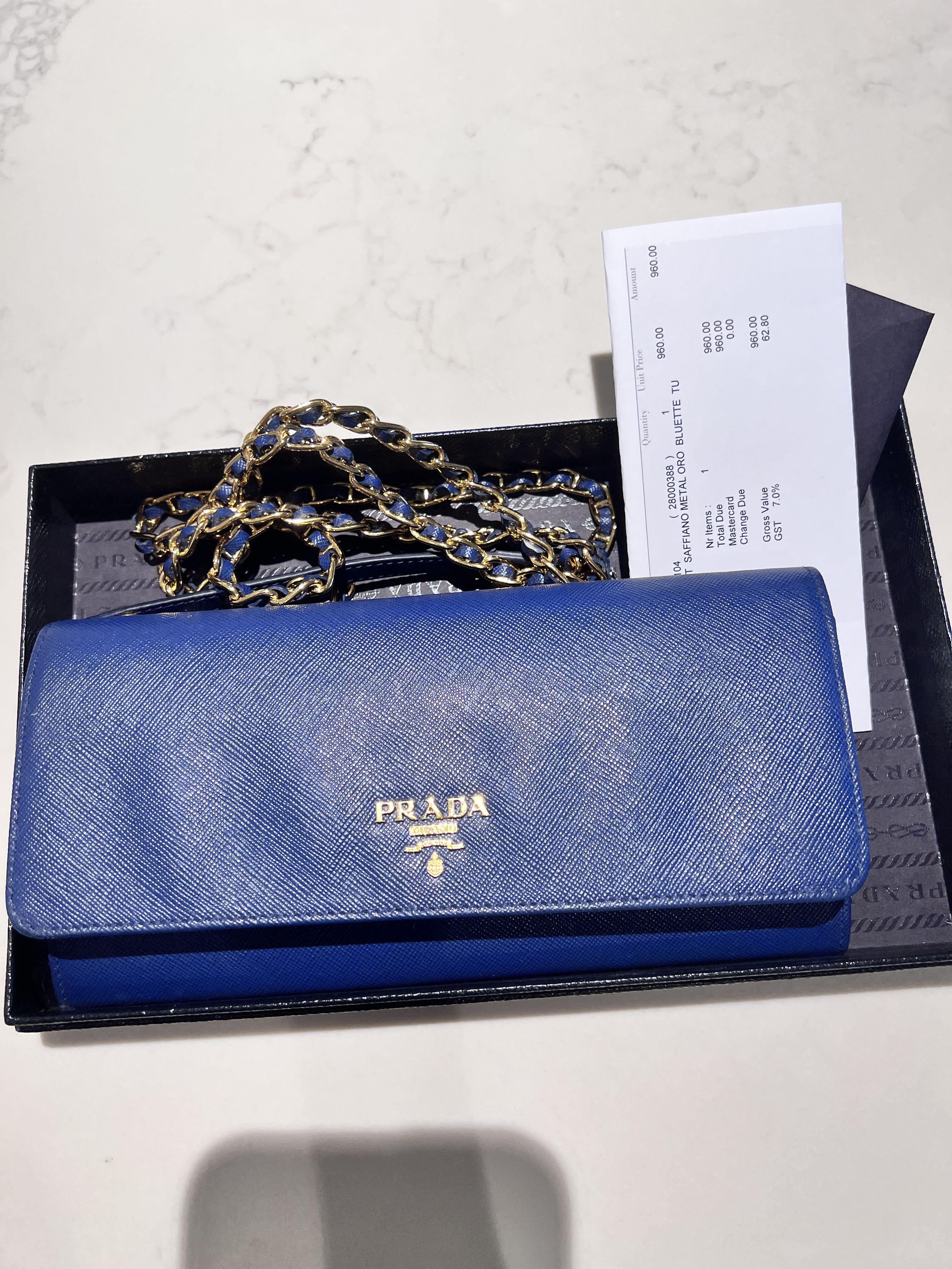 Prada wallet on chain saffiano leather, Women's Fashion, Bags & Wallets,  Purses & Pouches on Carousell