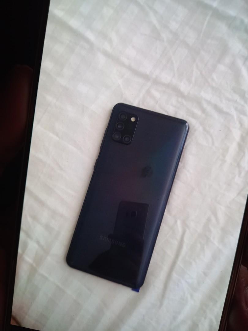 SUPER SALE! A31 Samsung Galaxy (Category: Samsung) located in Quezon City. Submitted by branded.preloved.decluttering (Listing ID 1168100365, Image 2). Description: used but not abuse first come first serve basis :) medyo bago pa naman tong unit, napalitan lang ng oled na lcd nung isang araw worth 3000+ sa sm north so medyo dim lang ng onti yung screen display nya pero hindi naman yun problema and the rest are working so fine. Good working condit