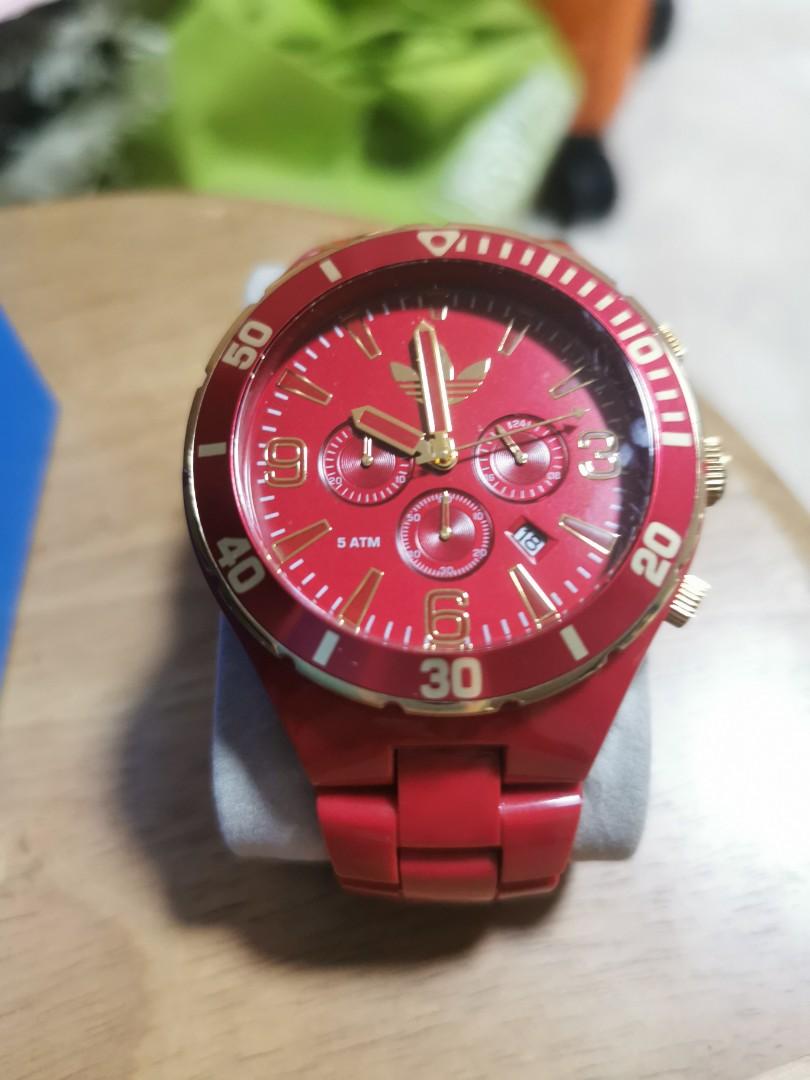 Red and gold hotsell watch