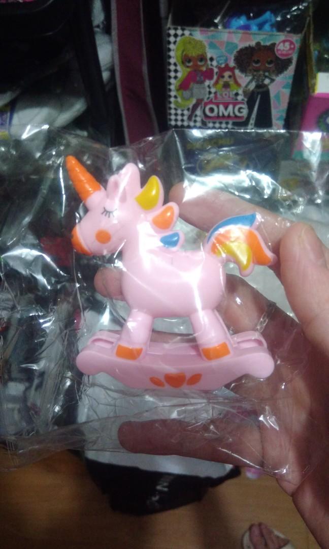BRANDNEW PINK UNICORN CAKE TOPPER (Category: Bakeware) located in Manila. Submitted by lucky7ph (Listing ID 1168299552, Image 1). Description: pink unicorn cake topper.
