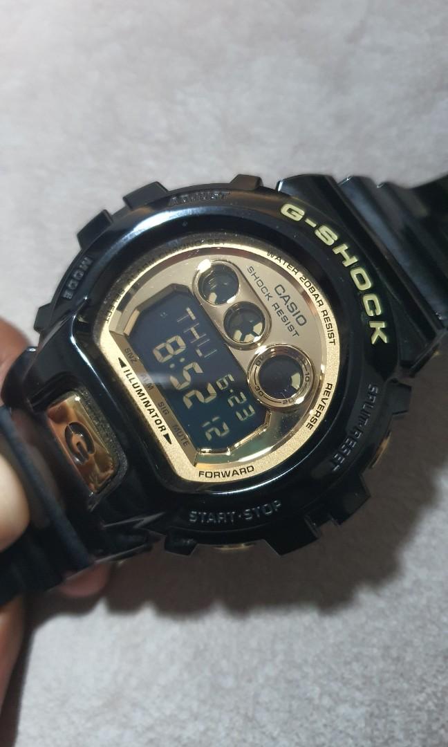 G shock illuminator black and gold hotsell