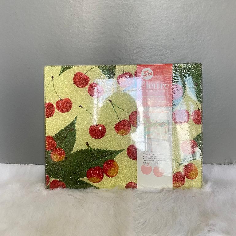 Fleure Cherry Glass Cutting Chopping Board (Category: Knives & Chopping Boards) located in Consolacion. Submitted by posh_avenue_home (Listing ID 1168291705, Image 1). Description: New with box. From Japan. 100% Authentic!!! 9.75" x 8".