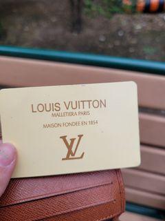 Louis Vuitton bi fold brass lin monogram