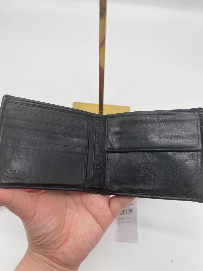 Salvatore Ferragamo bifold wallet (Category: Luxury Bags & Wallets) located in Manila. Submitted by davidspreowned (Listing ID 1168367194, Image 3). Description: Salvatore Ferragamo bi fold wallet Calf skin black color It comes with Box Tags There’s a hole inside the coin slot Rubs in the upper corner Signs of usage was seen on the detailed photos posted this was a preloved wallet please manage your expectation .