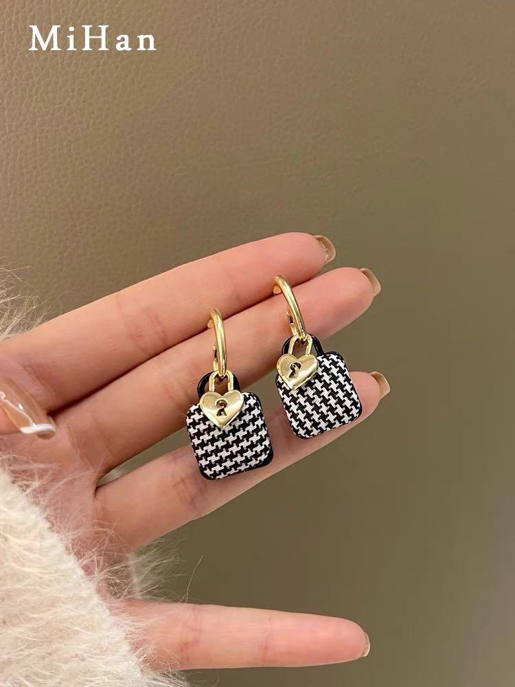 White on sale statement earrings