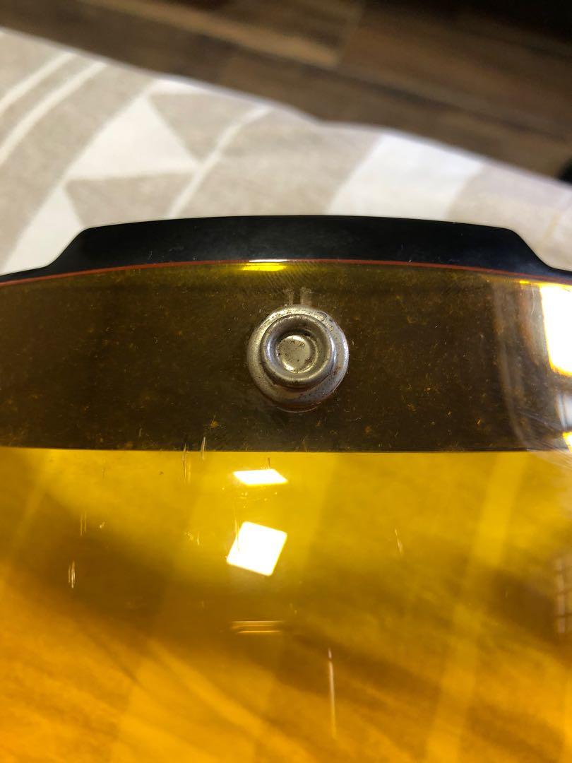 Bubble Visor (Category: Motorcycle Apparel) located in Singapore. Submitted by lowballmania (Listing ID 1168434878, Image 3). Description: Used bubble visor for sale. Used it on a Jipang helmet. The button tacks have turned a little rusty and micro scratches are visible but do not obstruct vision. Bought at $60+. RFS: Under-utilised, used less than 5 times. Collection: - Bedok Reservoir (Eunos MRT) - Grab express delivery (paid by customer)..