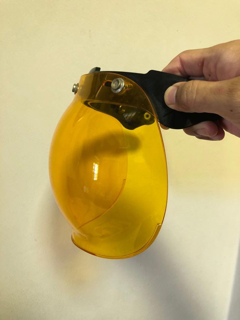 Bubble Visor (Category: Motorcycle Apparel) located in Singapore. Submitted by lowballmania (Listing ID 1168434878, Image 2). Description: Used bubble visor for sale. Used it on a Jipang helmet. The button tacks have turned a little rusty and micro scratches are visible but do not obstruct vision. Bought at $60+. RFS: Under-utilised, used less than 5 times. Collection: - Bedok Reservoir (Eunos MRT) - Grab express delivery (paid by customer)..