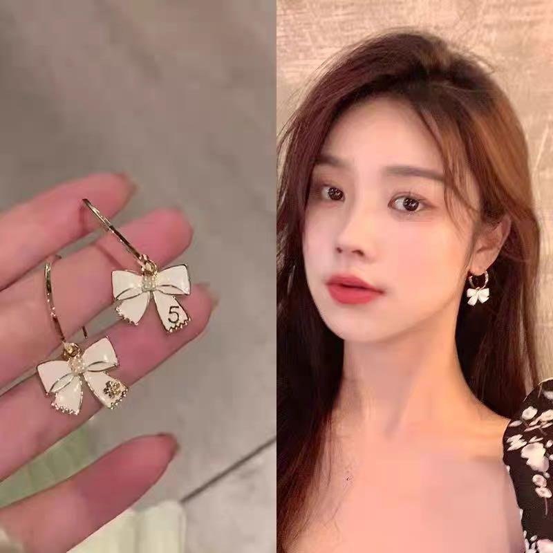 Cute white top earrings