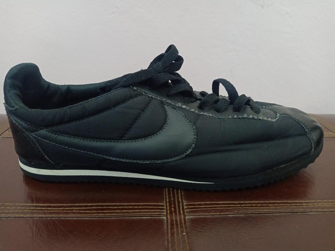 Triple black nike cortez sale