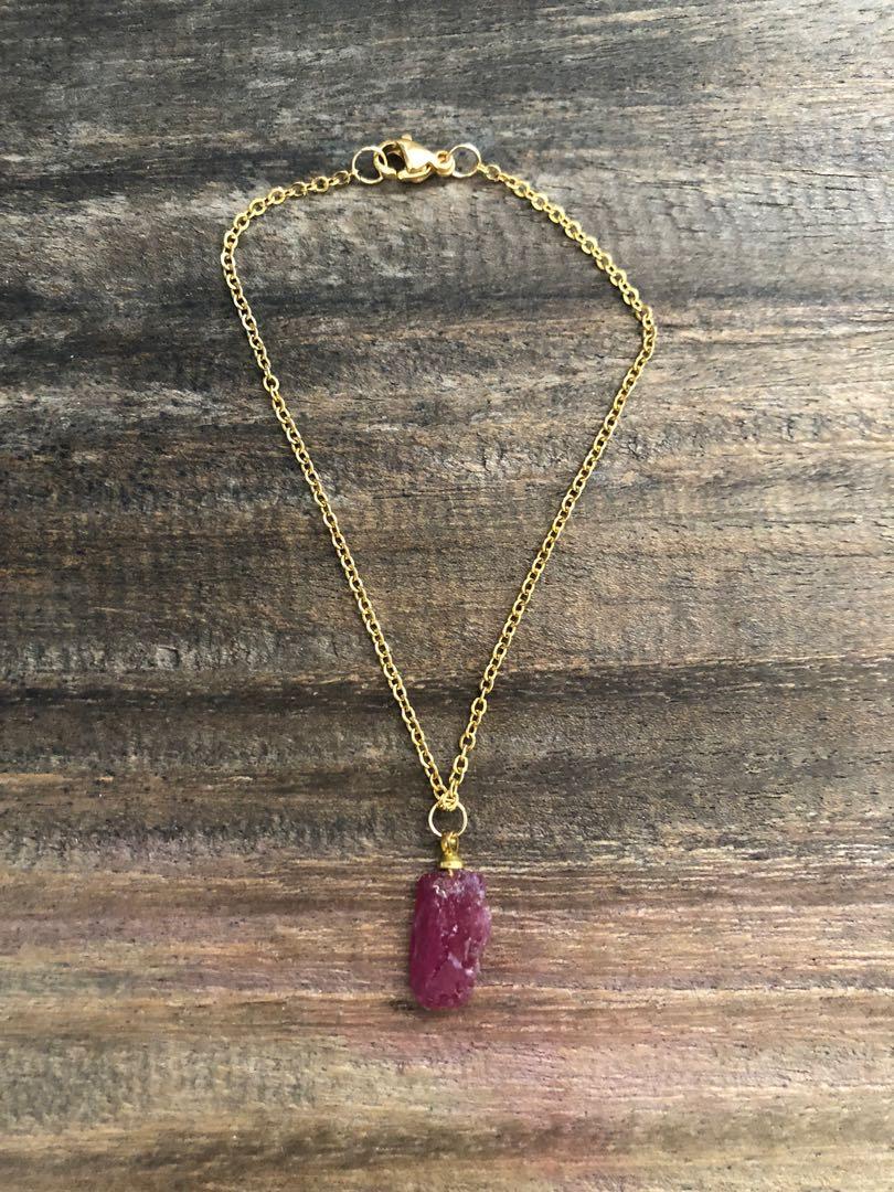 Raw cut Ruby (Category: Bracelets) located in Muntinlupa City. Submitted by declutter_with_me (Listing ID 1168480891, Image 2). Description: Raw cut Ruby with Gold Stainless Chain Length: 7” *can be adjusted to desired length(5”-9”).