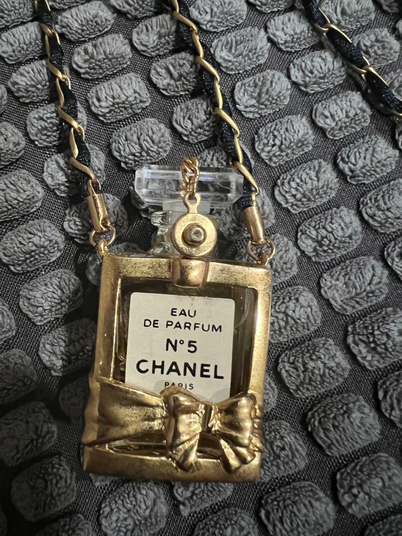 Chanel perfume bottle necklace clearance