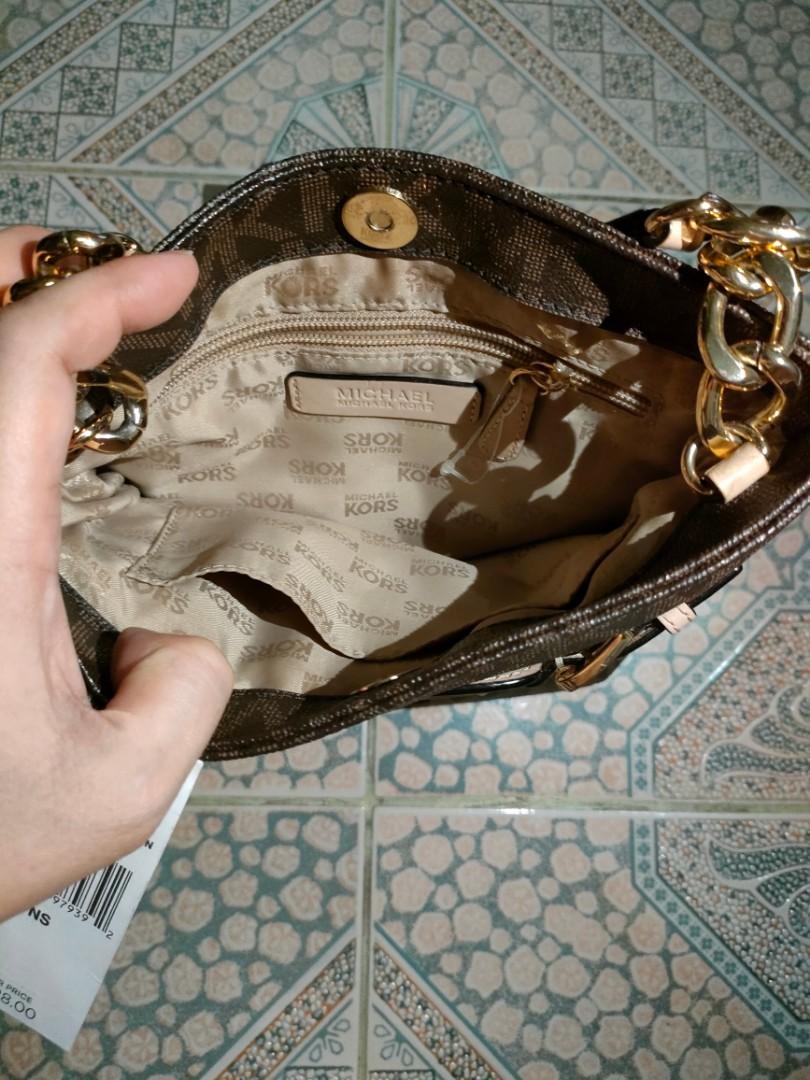 Michael Kors Hamilton Crossbody Bag (Category: Luxury Bags & Wallets) located in Bacoor. Submitted by aneworr (Listing ID 1168808339, Image 3). Description: 100% GUARANTEED ORIGINAL MICHAEL KORS (from USA) HAMILTON LG CROSSBODY BAG BROWN COLOR Bought for USD228 No issues Almost new, bagong bago, minsan lang nagamit when travelling abroad. RFS: Di nagagamit, sayang nakatago lang..