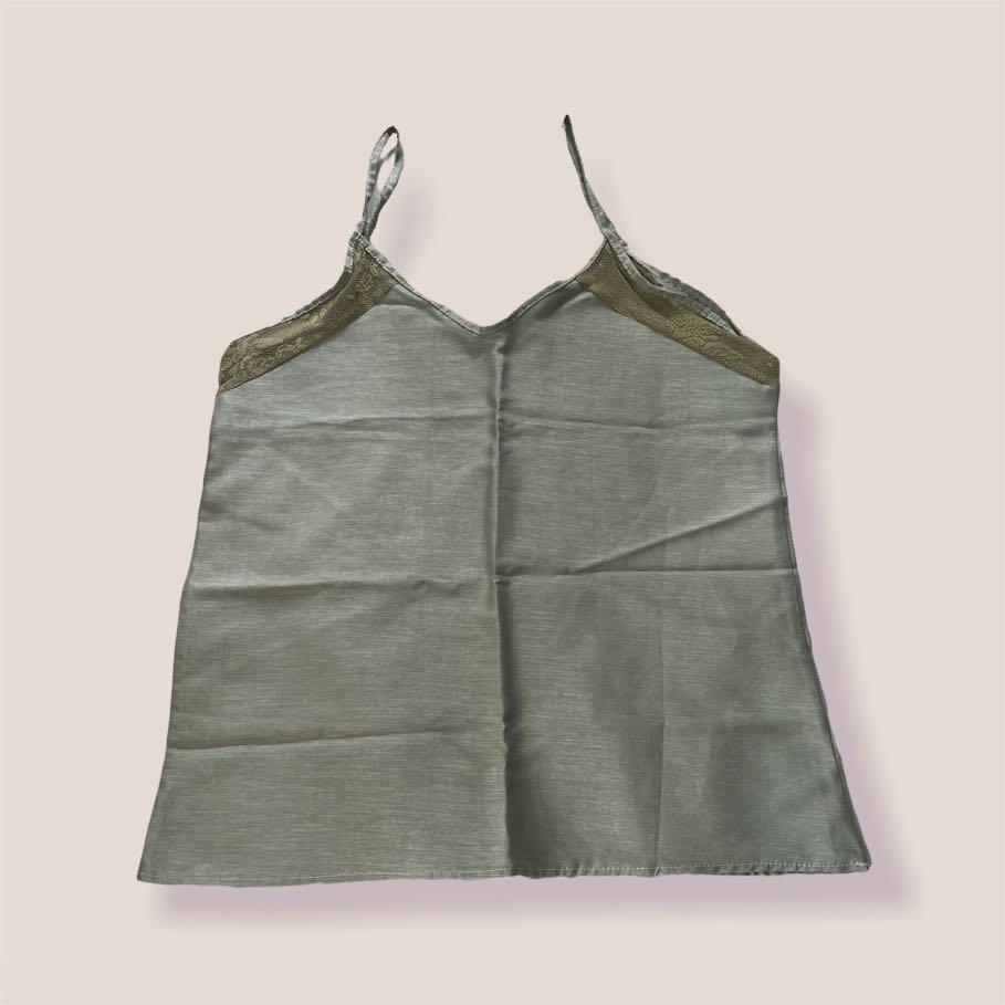 Sexy lace sage green top (Category: Sleeveless) located in Quezon City. Submitted by wmbbr (Listing ID 1168705778, Image 1). Description: Really nice in person.
