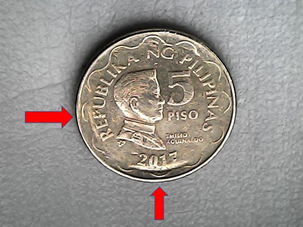 5 Piso Error Coin (Category: Currency) located in Pasig City. Submitted by askabel (Listing ID 1169002040, Image 2). Description: dko alam tawag sa ganyang error.. kita naman sa pics.. 4 pcs po yan na ibat iba error.. 2017, 2005, 1997 hindi naman ako collector.. bka sakaling may naghahanap sa inyo ng ganitong coin. nakikita ko lang sa youtube at Lazada mga coins na pwede pala ibenta. nagkataon na meron ako.. so ikaw na bahala sakin boss sa presyo